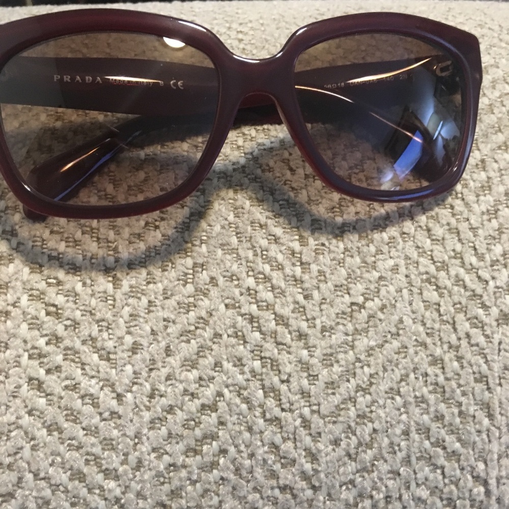 Women Prada sunglasses Their burgundy color